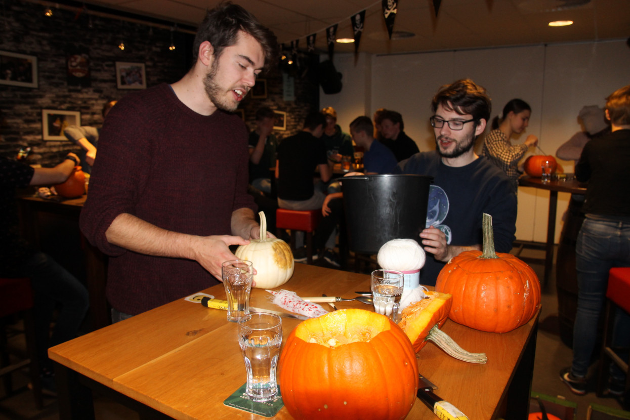 Pumpkin carving and Halloween drink