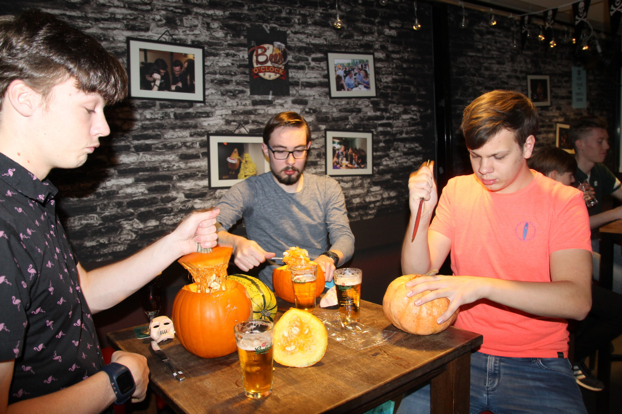 Pumpkin carving and Halloween drink