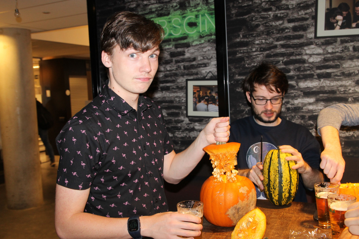 Pumpkin carving and Halloween drink