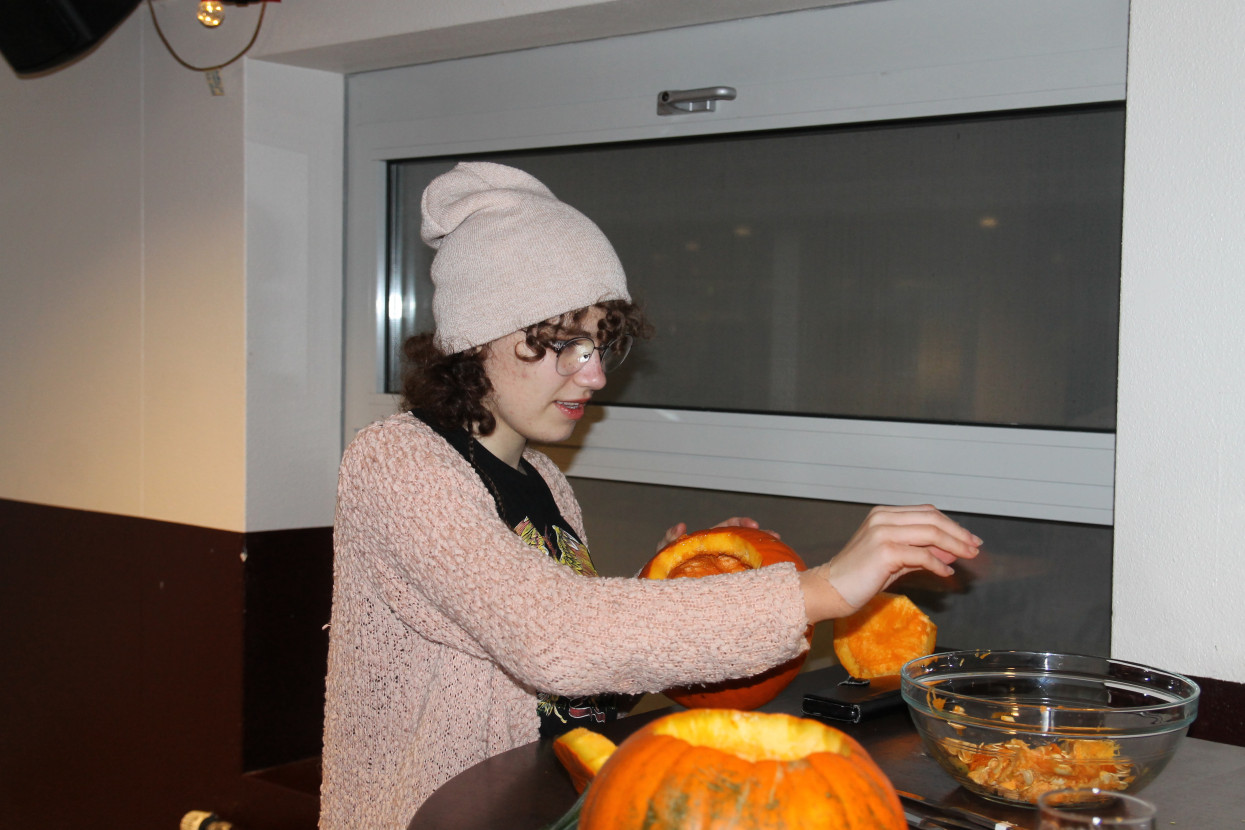 Pumpkin carving and Halloween drink