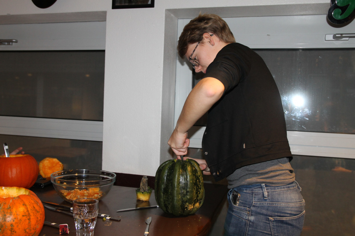 Pumpkin carving and Halloween drink