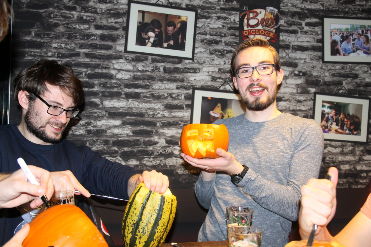 Pumpkin carving and Halloween drink