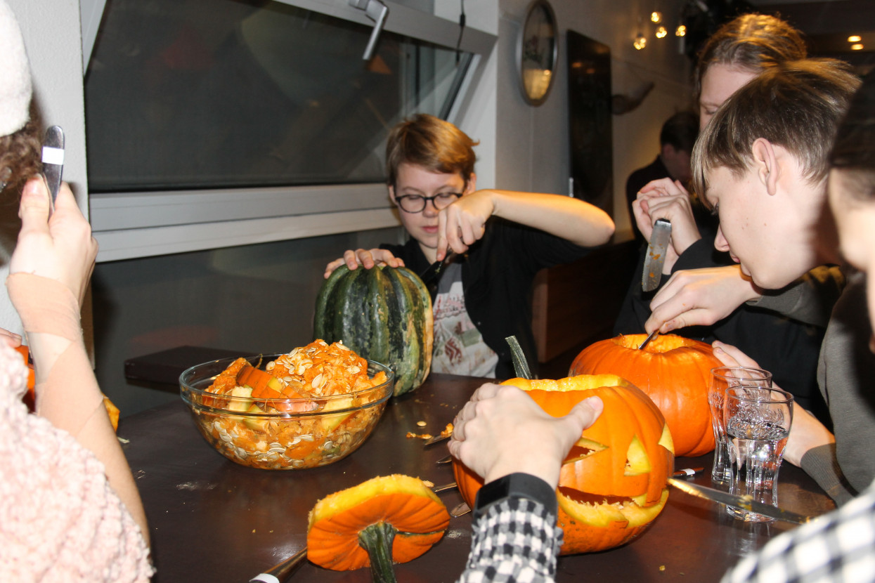 Pumpkin carving and Halloween drink