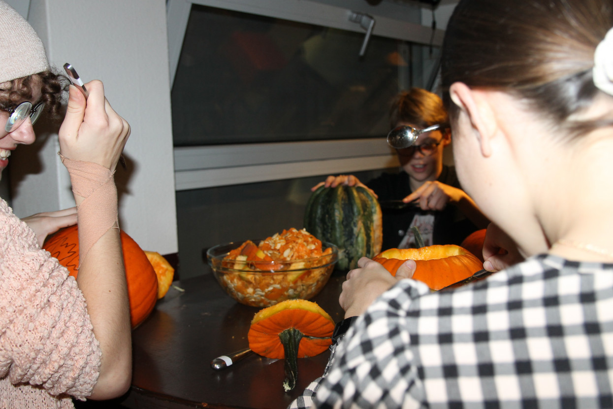 Pumpkin carving and Halloween drink