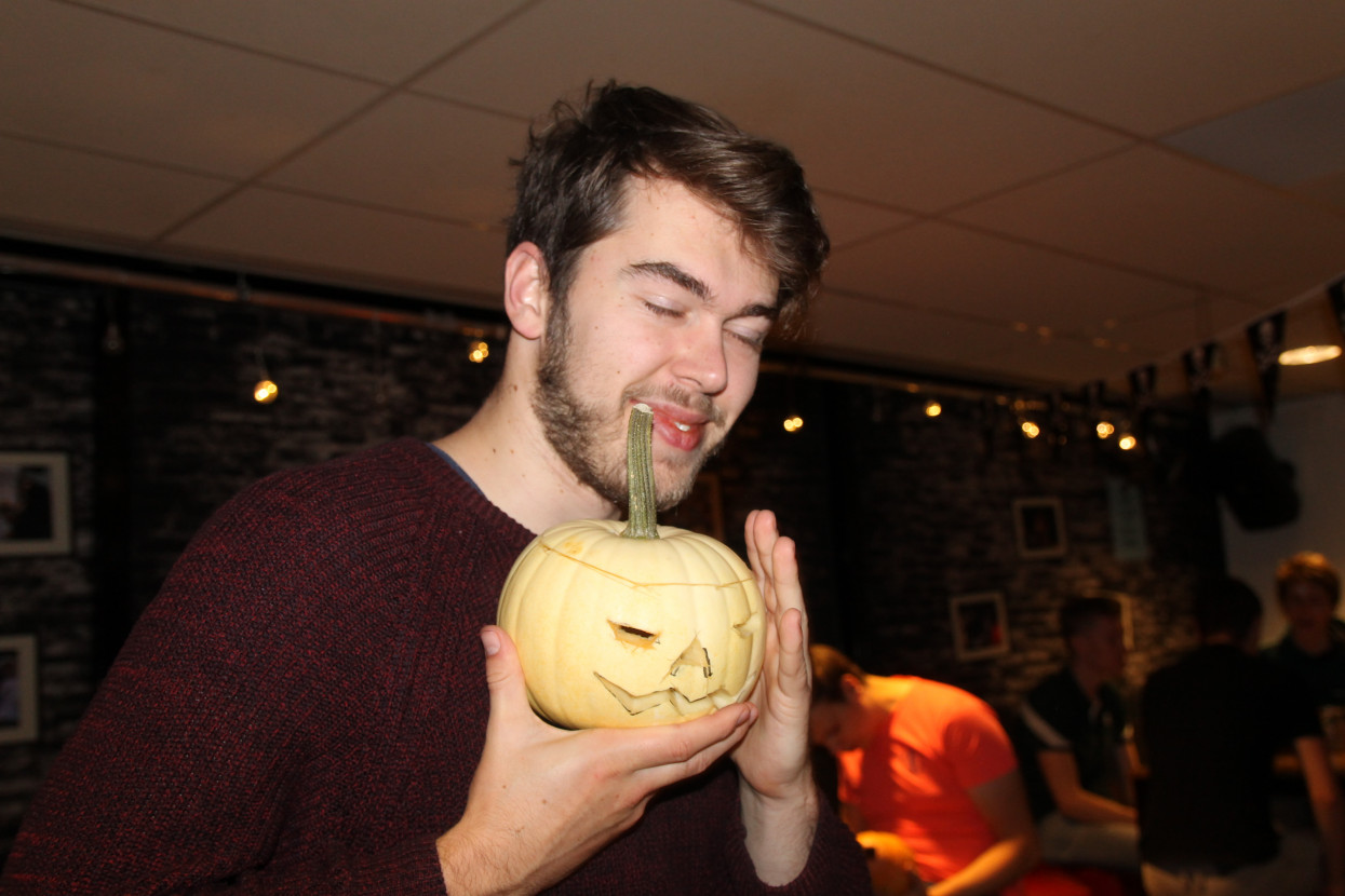 Pumpkin carving and Halloween drink