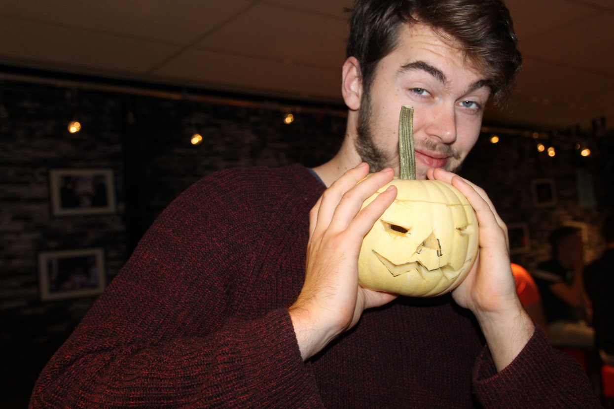 Pumpkin carving and Halloween drink