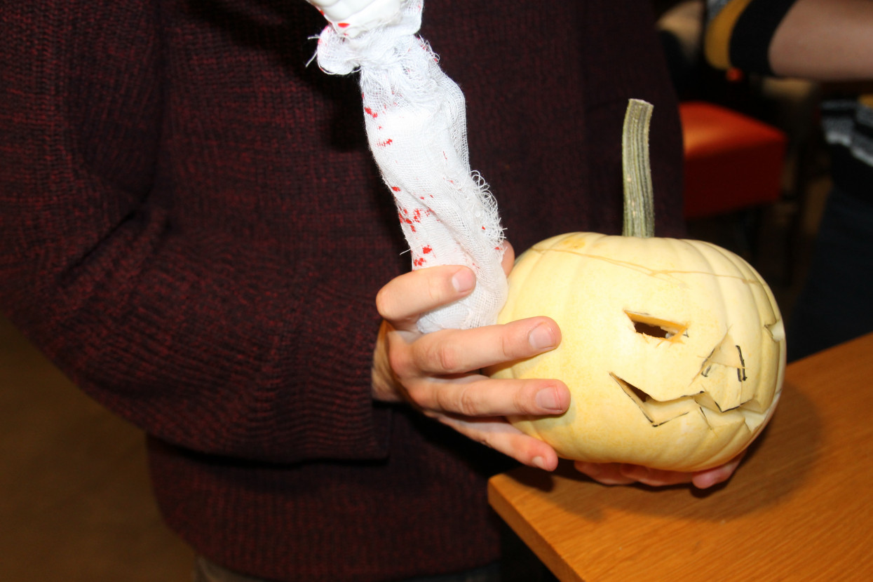 Pumpkin carving and Halloween drink