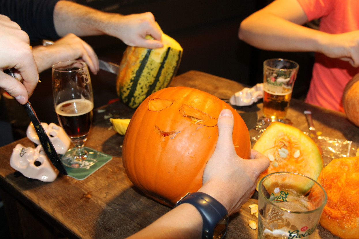 Pumpkin carving and Halloween drink