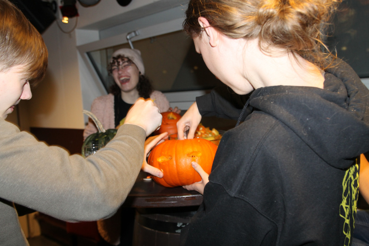 Pumpkin carving and Halloween drink