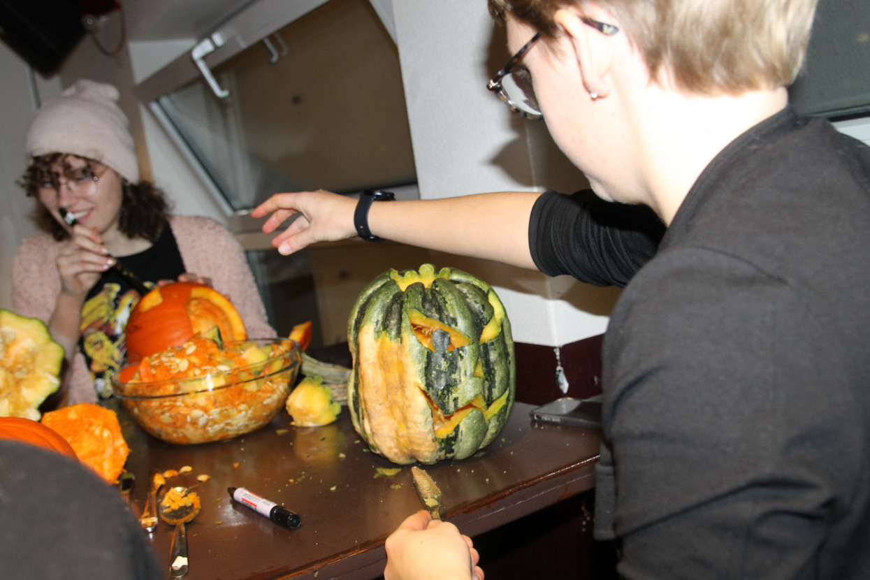 Pumpkin carving and Halloween drink