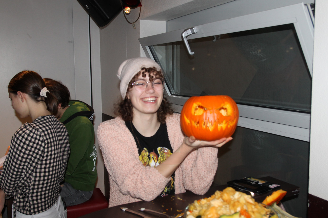 Pumpkin carving and Halloween drink