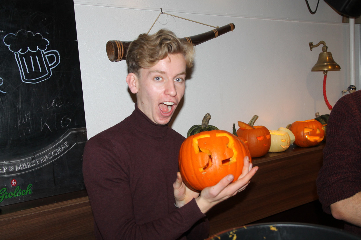 Pumpkin carving and Halloween drink