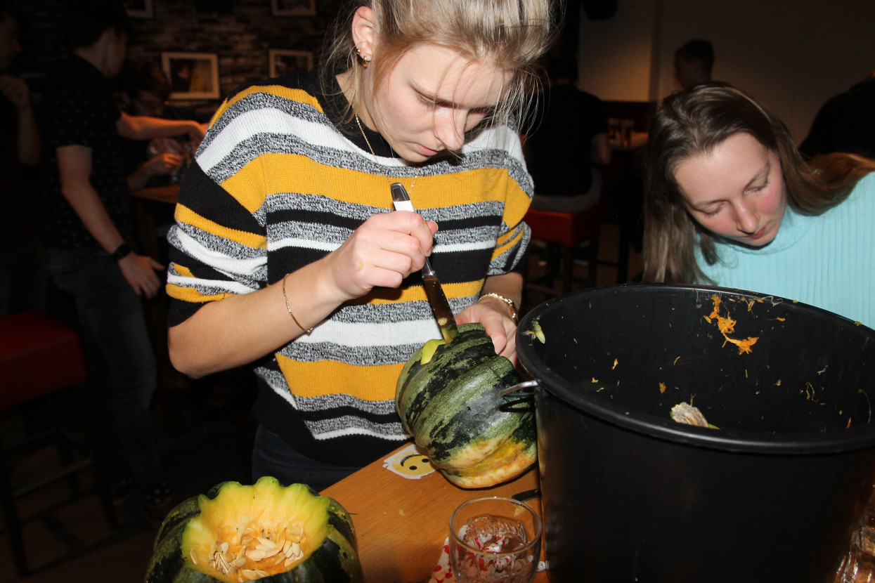 Pumpkin carving and Halloween drink