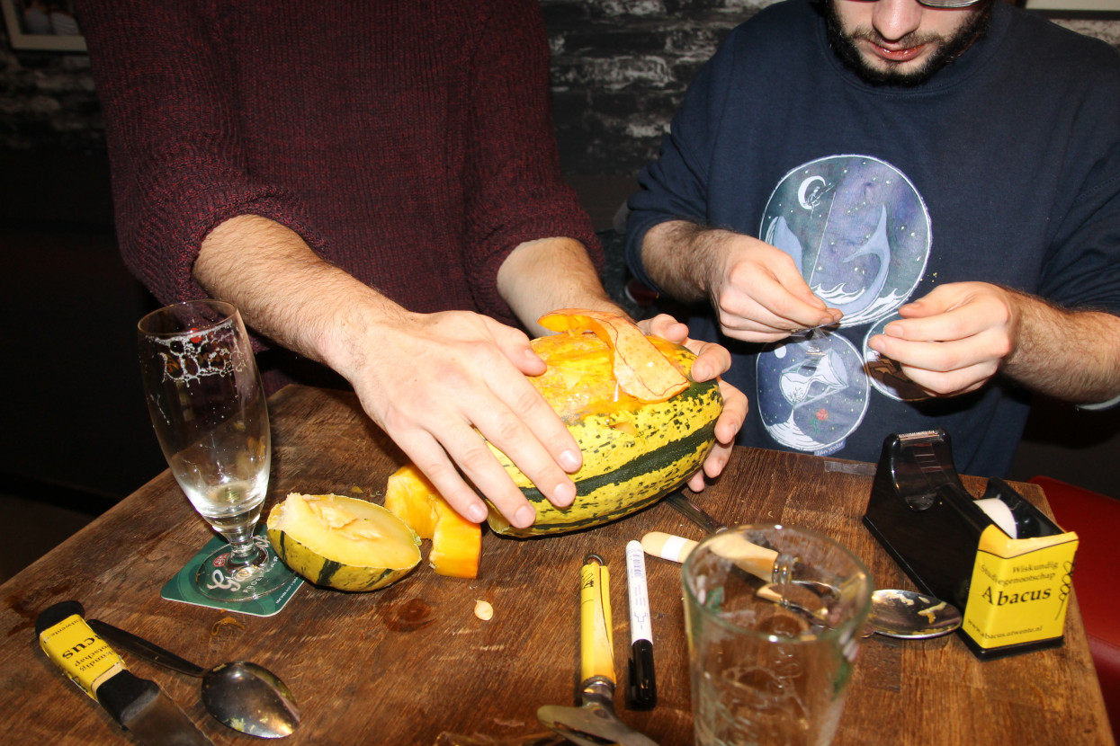 Pumpkin carving and Halloween drink