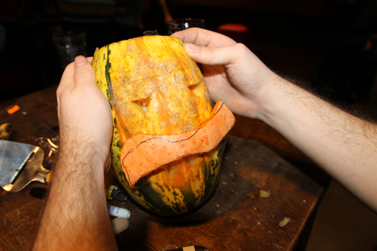 Pumpkin carving and Halloween drink