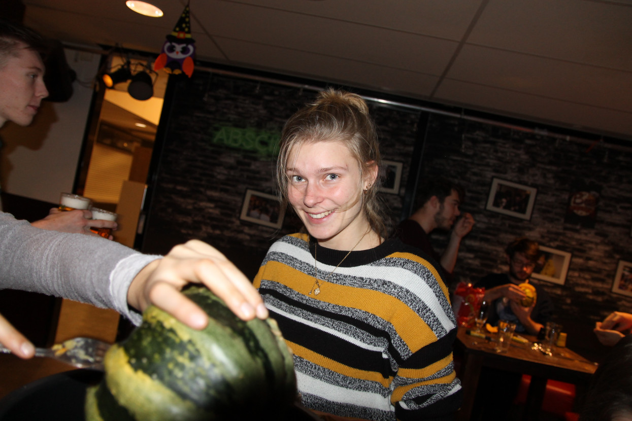 Pumpkin carving and Halloween drink