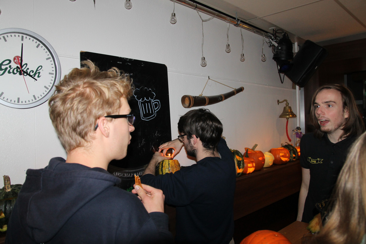 Pumpkin carving and Halloween drink