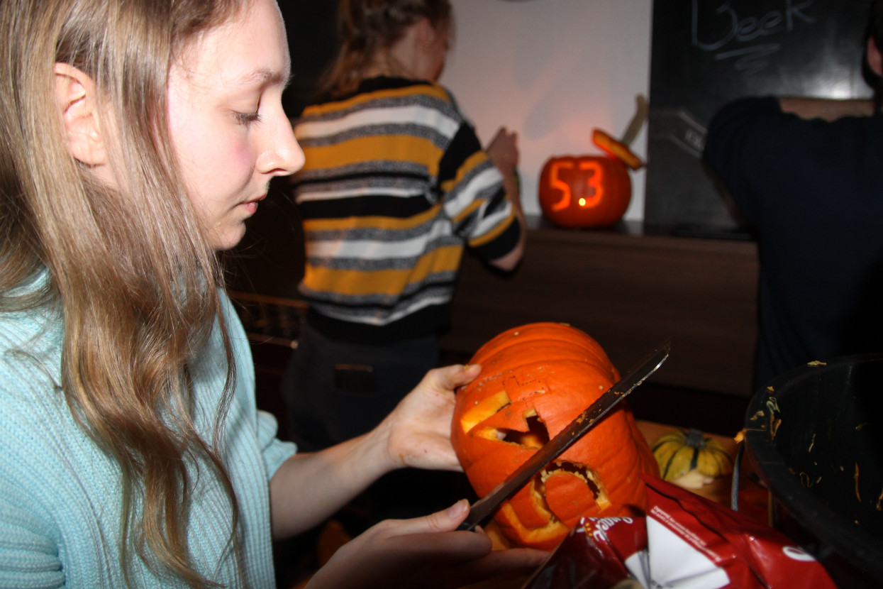 Pumpkin carving and Halloween drink