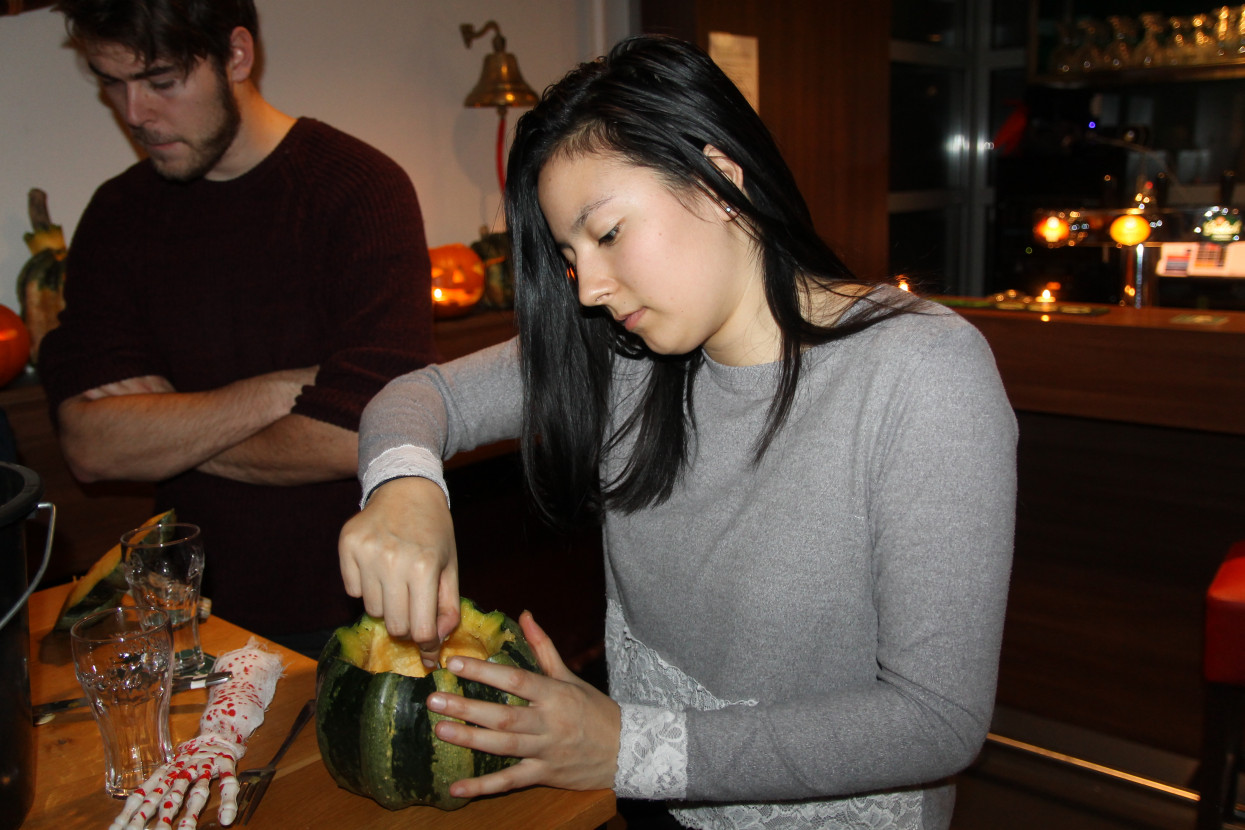 Pumpkin carving and Halloween drink