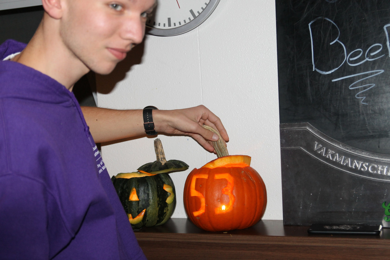 Pumpkin carving and Halloween drink