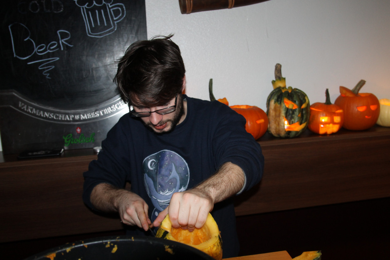 Pumpkin carving and Halloween drink