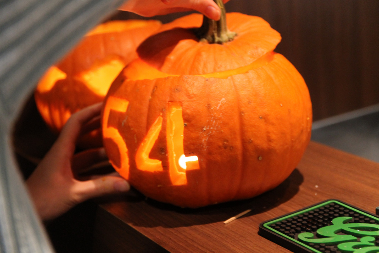 Pumpkin carving and Halloween drink