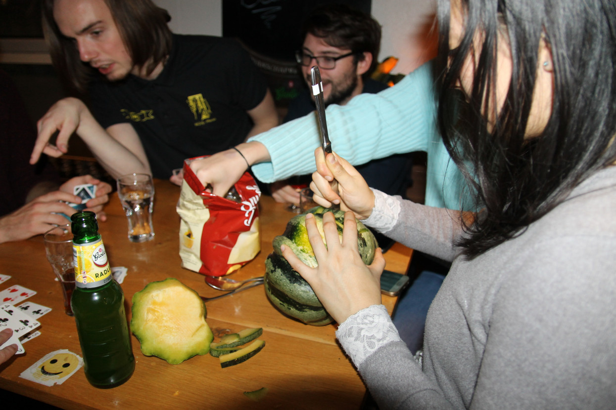 Pumpkin carving and Halloween drink