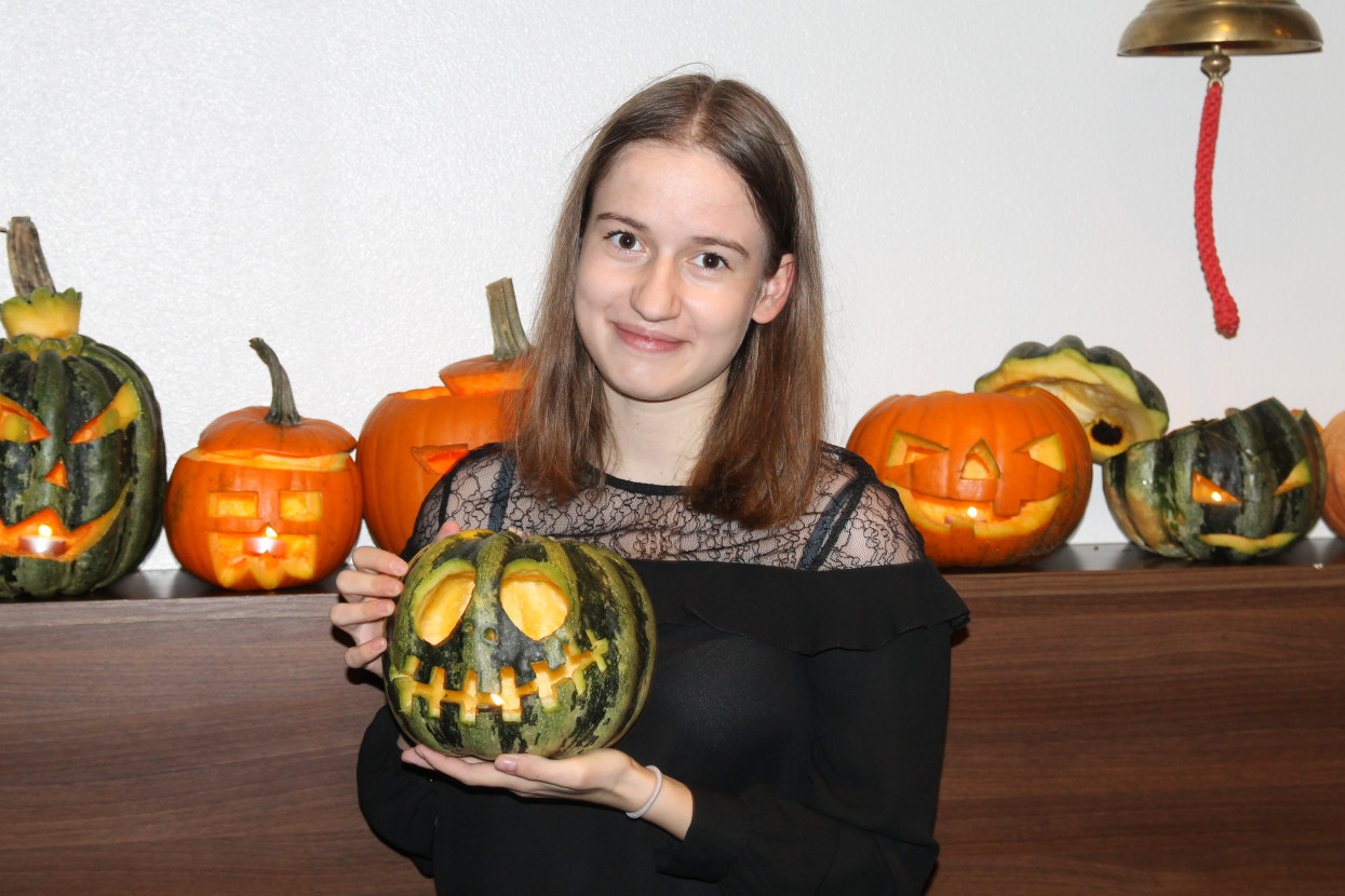 Pumpkin carving and Halloween drink